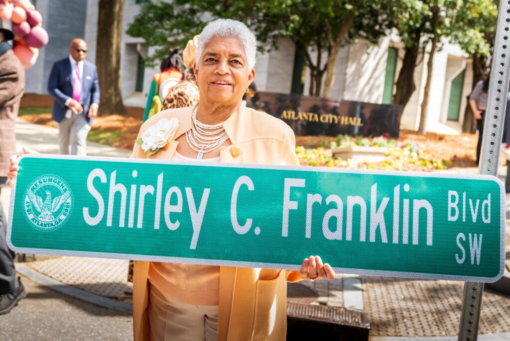 Mayor Franklin with street sign