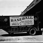 Image of a trailer with a WAGA FM and tv sign on it for Cracker Baseball