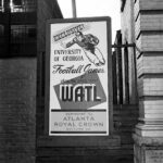 Black and white image of WATL radio's sign for play by play coverage of University of Georgia football games