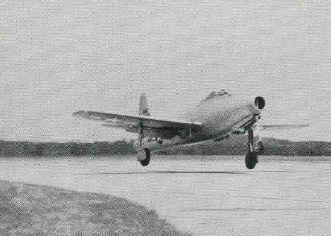 Black and white photograph of a small plane taking off; the original caption of the photo reads: Georgia National Guard Capt. Barney Casteel at the controls of the first F-84 Thunderjet assigned to the 128th Fighter Squadron. On Jan 21, 1952, while assigned to the 136th Bomber Wing, Casteel was killed conducting an armed reconnaissance mission north of Pyongyang, North Korea. He was the last Georgia Air National Guard pilot killed in Korea.
